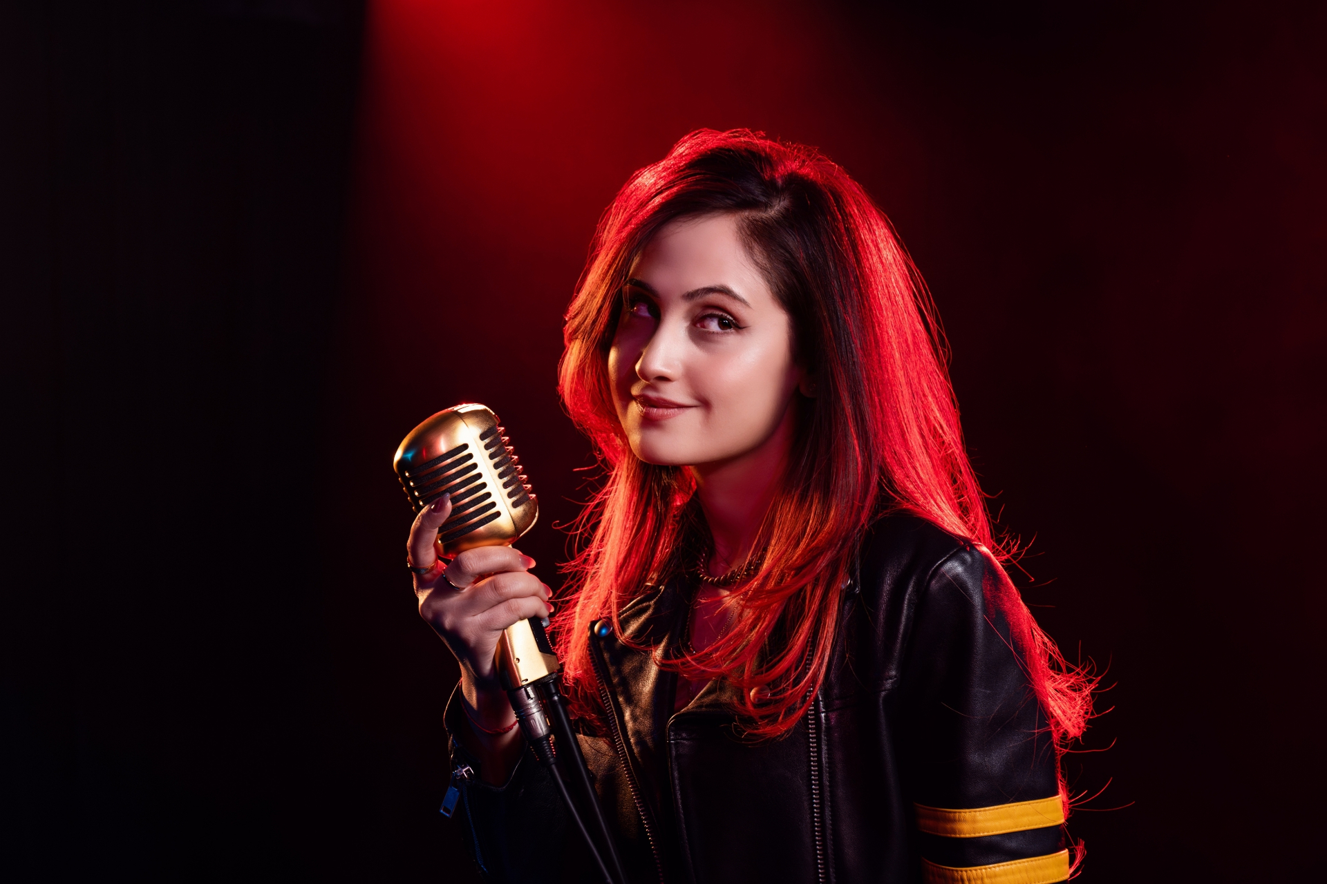 Noor Marji — portrait with gold mic